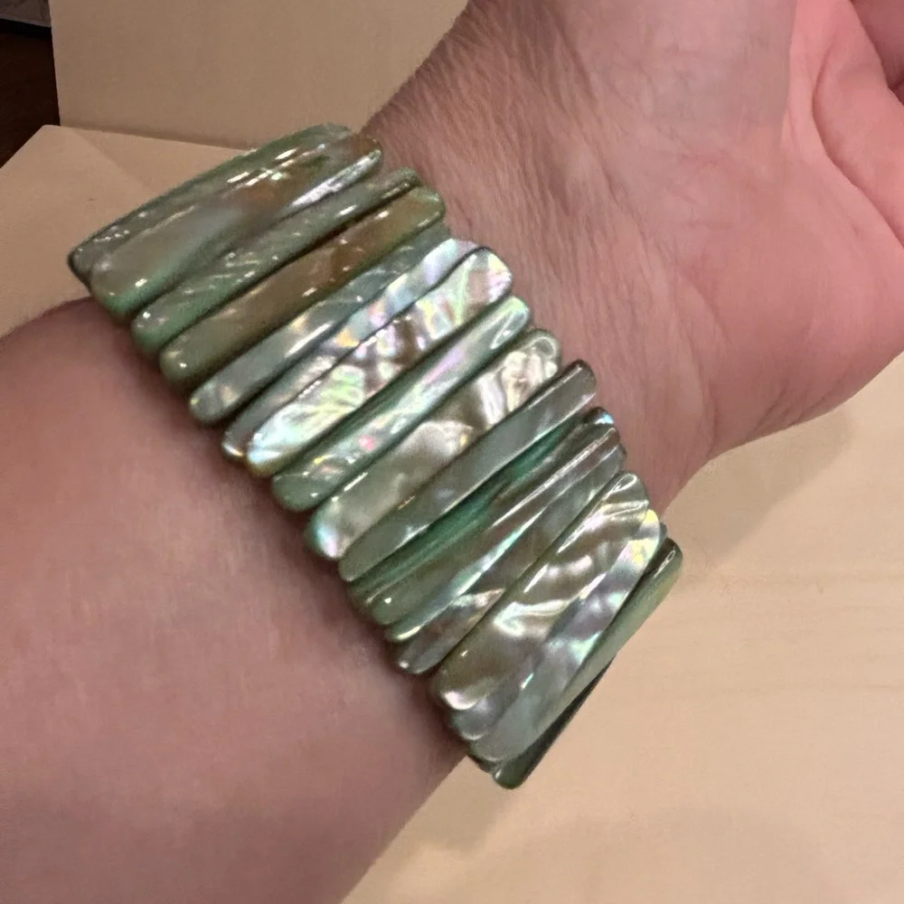Mother of Pearl Abalone Shell light green shades panel stretch bracelet.